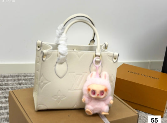 White lv tote w labubu
