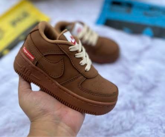 Women’s brown Supreme dunks