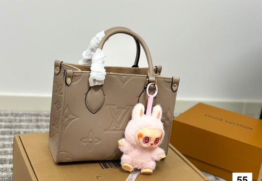 Beige Lv tote w labubu