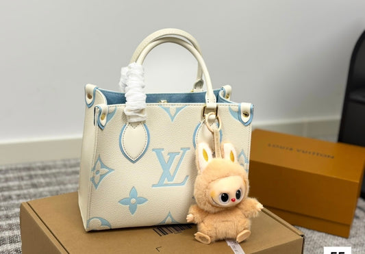 White Lv tote w labubu