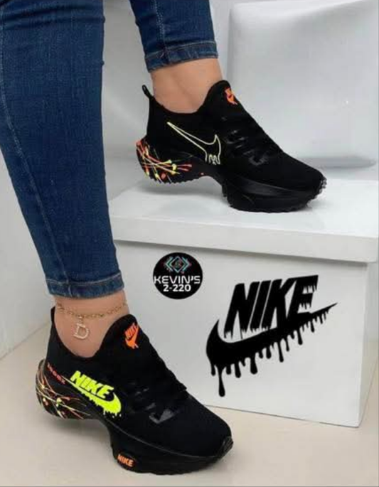 Womens black/neon yellow nikes