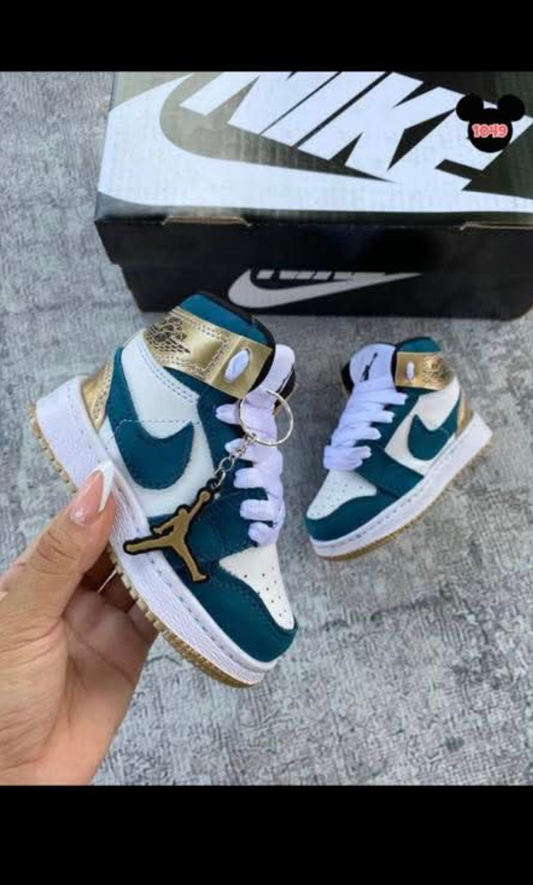Womens teal/gold nike