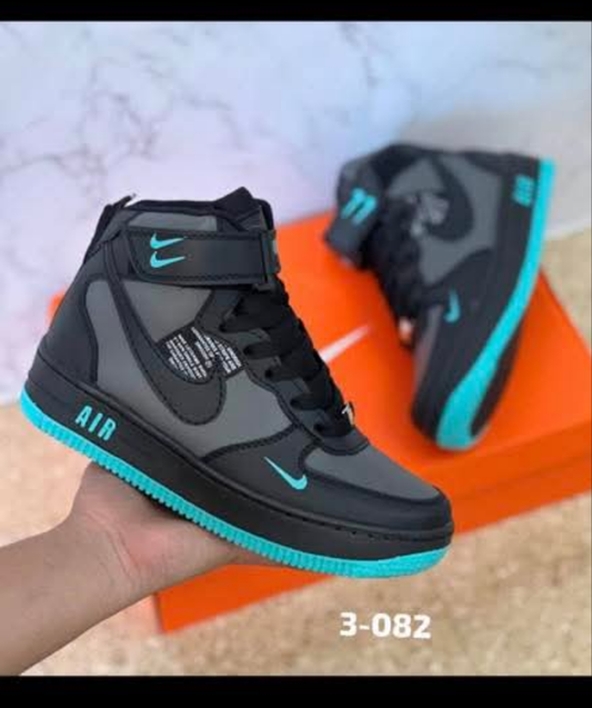Kids black/teal nike