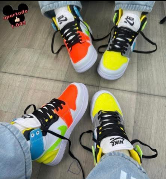 Kids orange/yellow/blue/green nikes